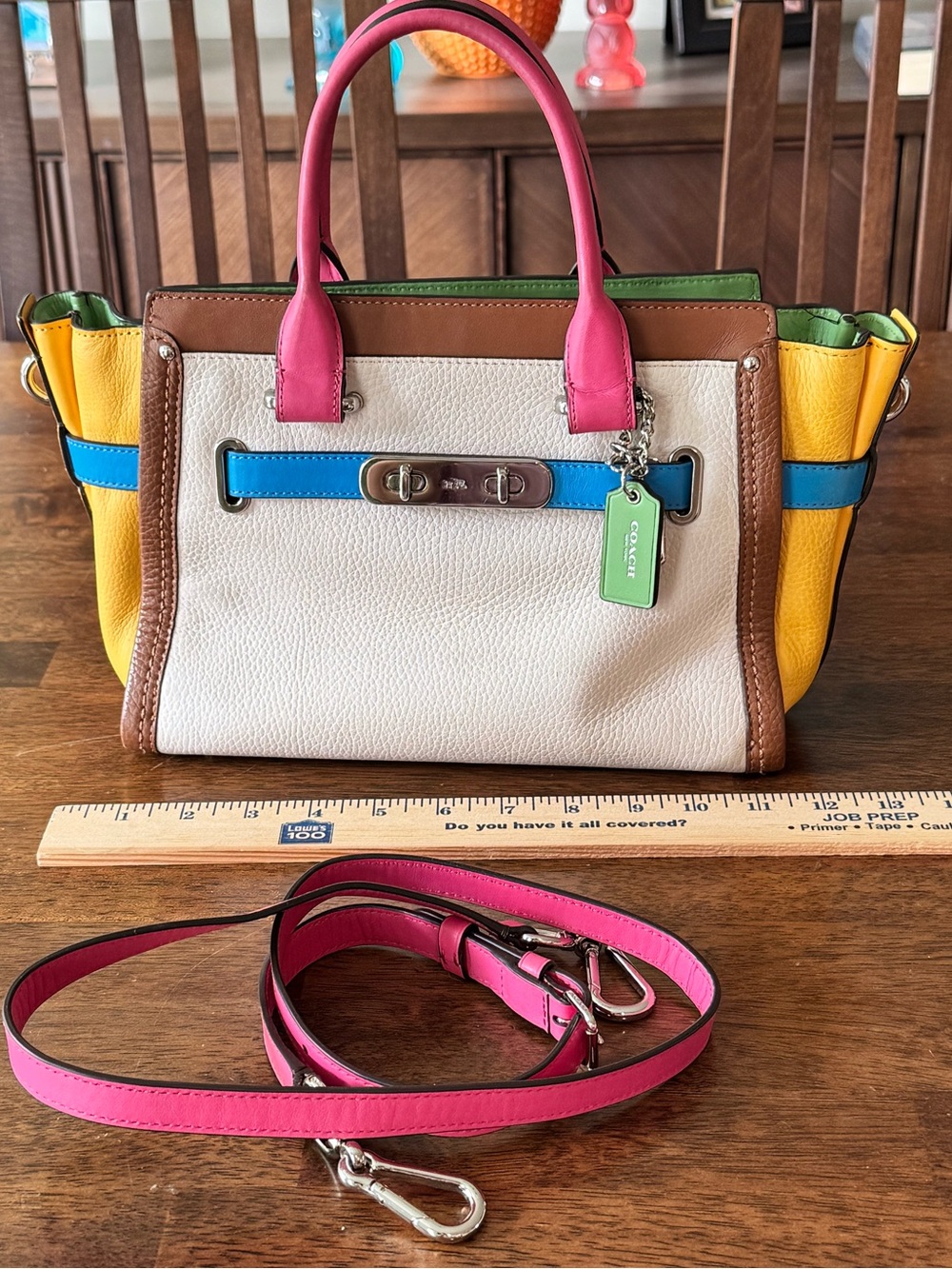 Coach Swagger 27
In Rainbow Color-block green pink yellow